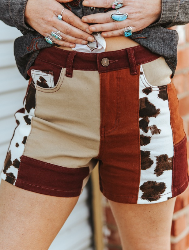 Lucky & Blessed Women's Rust and Cow Print Patchwork Denim Shorts