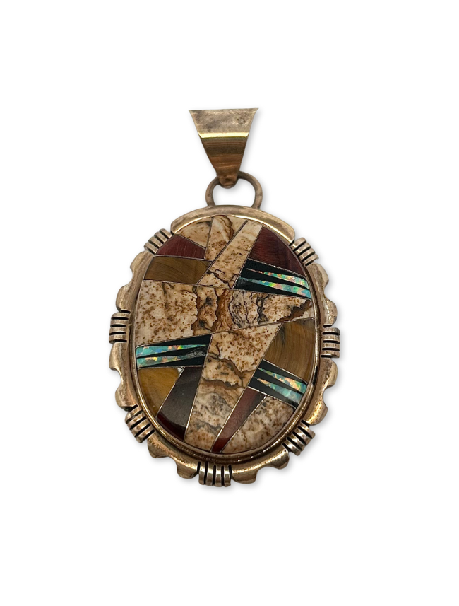 Top down view of Alfred Martinez sterling silver multicolor inlay pendant