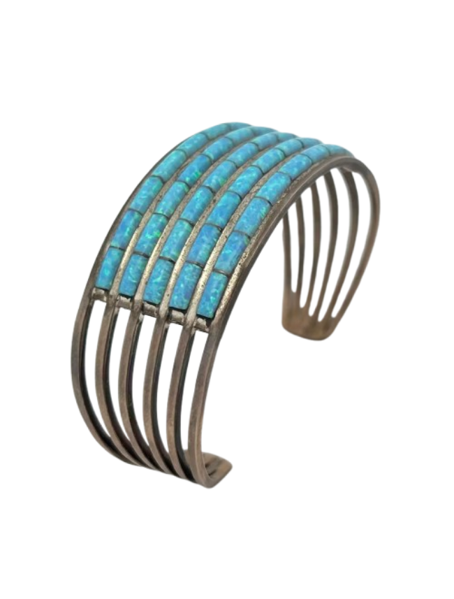 Side view of Ansom Wallace sterling silver opal cuff bracelet