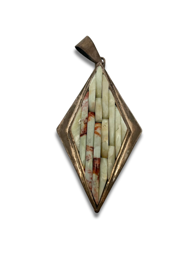 Front view of Carlos Eagle sterling silver spiny oyster shell pendant