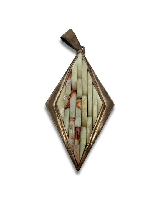 Front view of Carlos Eagle sterling silver spiny oyster shell pendant