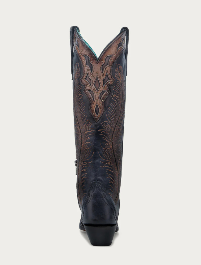 Black cowboy boot with intricate brown leather stitching on a white background
