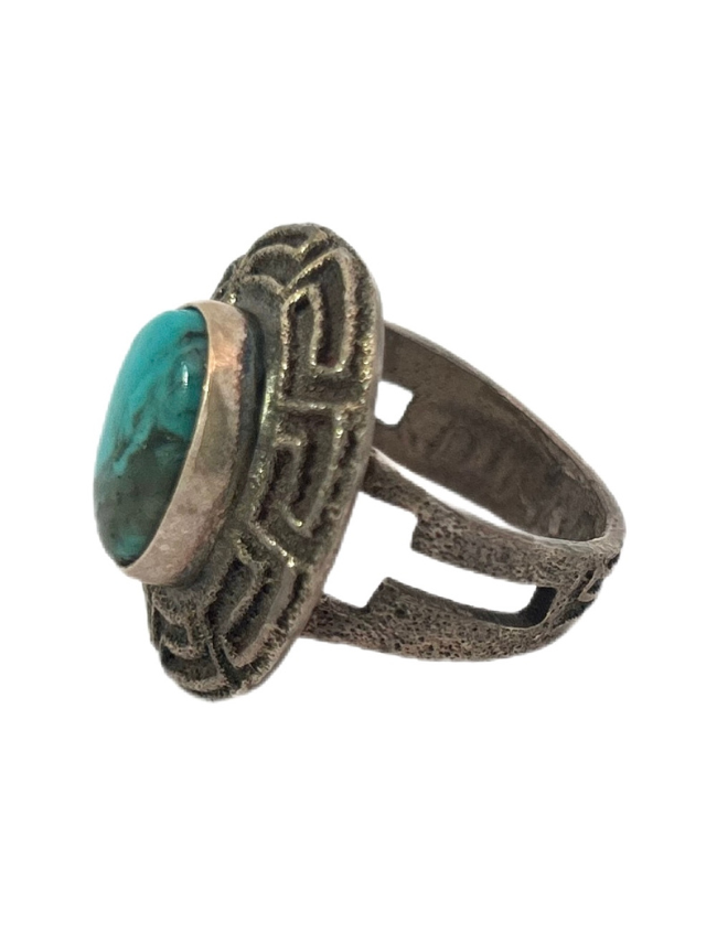 Side view of Dino Garcia sterling silver turquoise ring