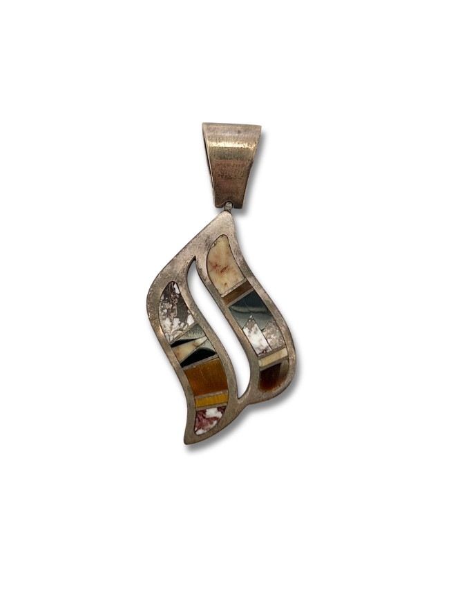 Front, top view of Don Lucas sterling silver multicolor inlay pendant
