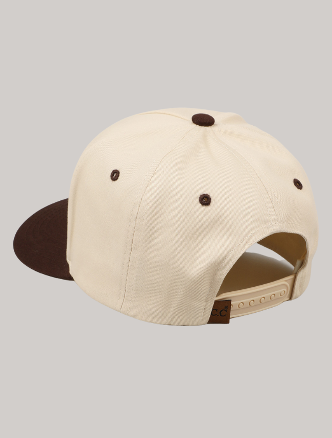 Adjustable snapback closure and breathable mesh backing in tan, designed for comfort and fit.