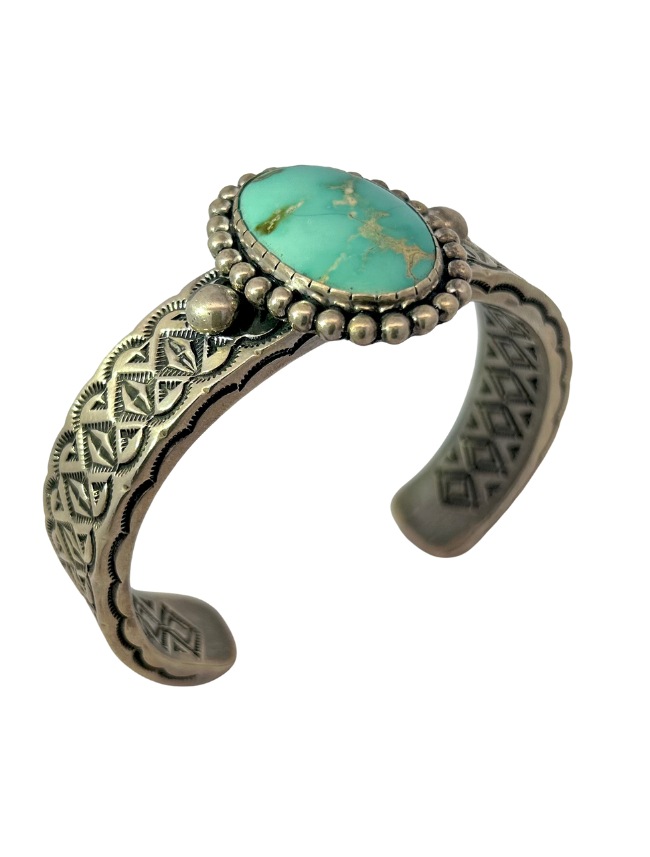 Three quarter view of Johnathan Nez Sterling Silver Turquoise Cuff Bracelet