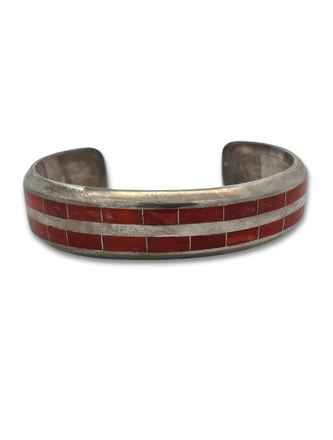 Front view of Johnny Coonsis sterling silver coral inlay cuff bracelet
