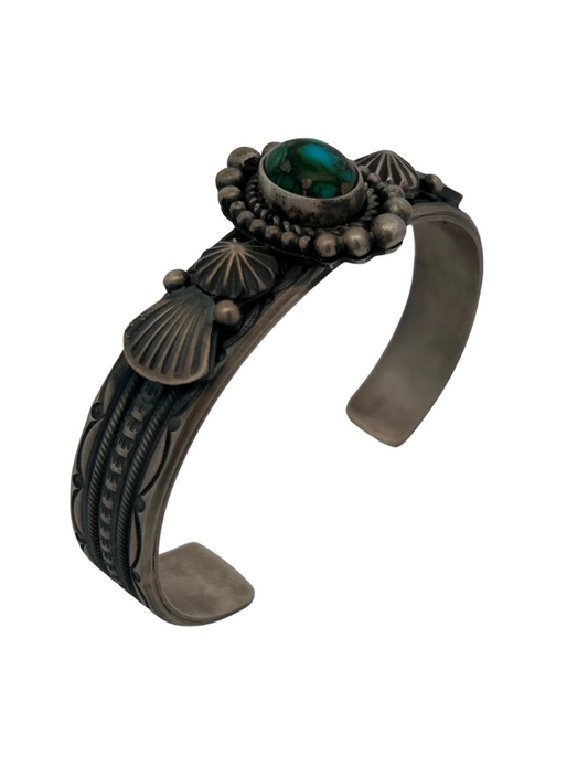 Side, three quarter view of M.C. Sterling Silver Kingman Turquoise Cuff Bracelet