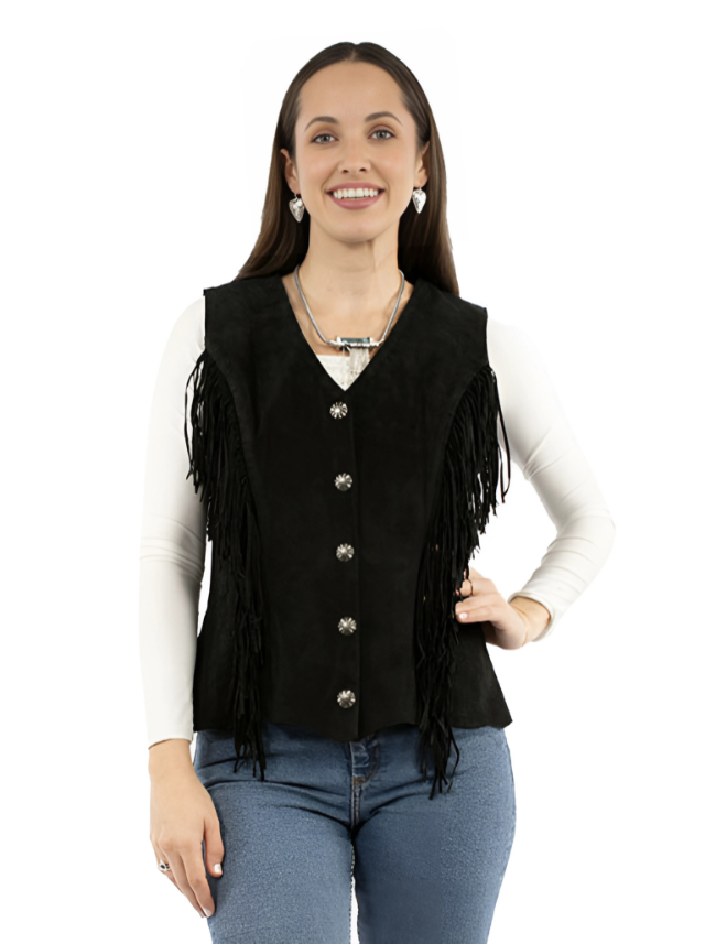 Woman wearing a black fringed vest over a white long-sleeve shirt on a white background