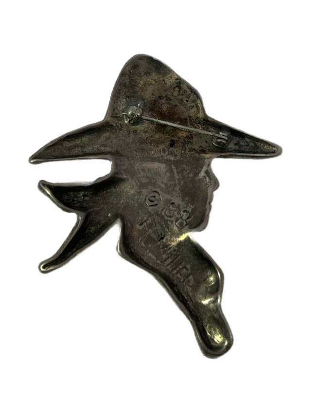 Back view of R. Miller Sterling Silver Western Silhouette Pin with focus on R. Miller hallmark