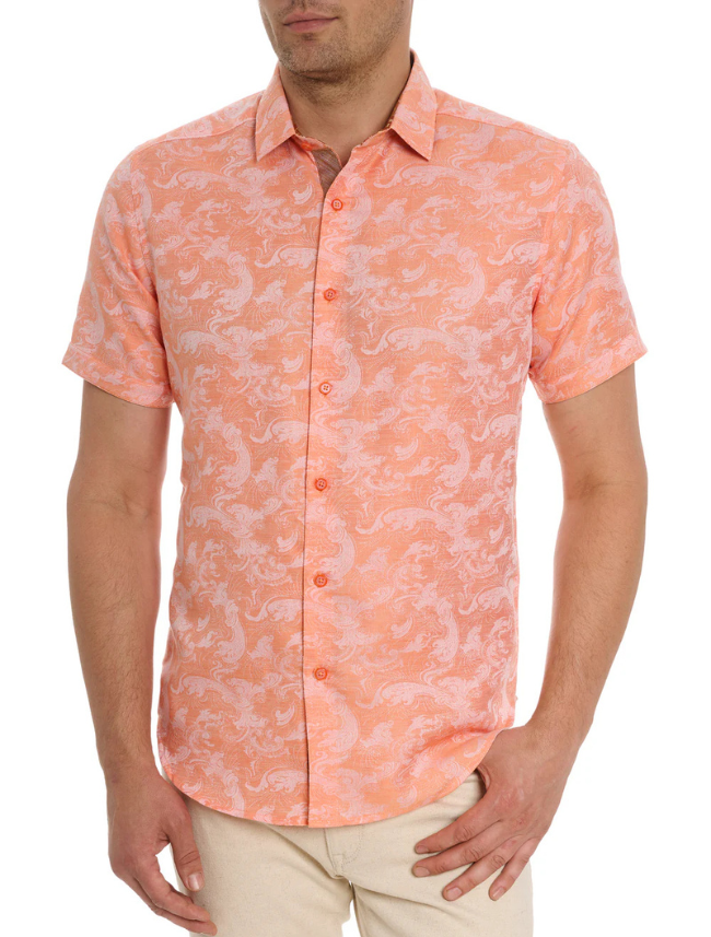 Man wearing an orange patterned shirt on a white background