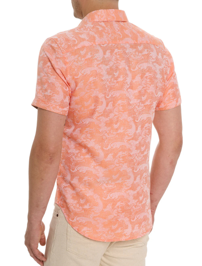 Person wearing a patterned orange shirt on a white background