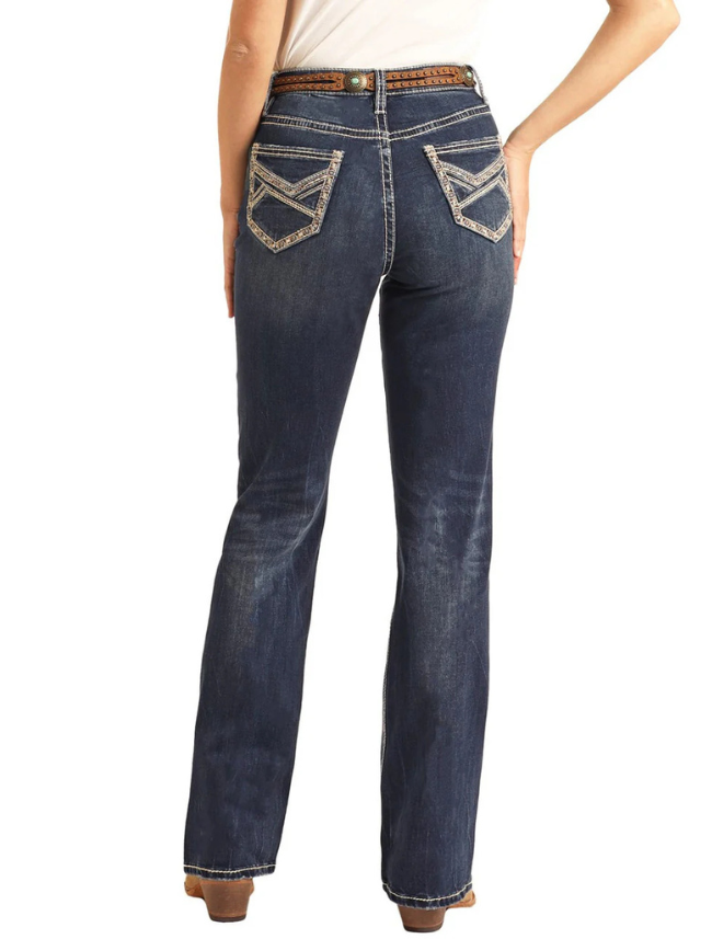 Blue jeans worn by a person on a white background