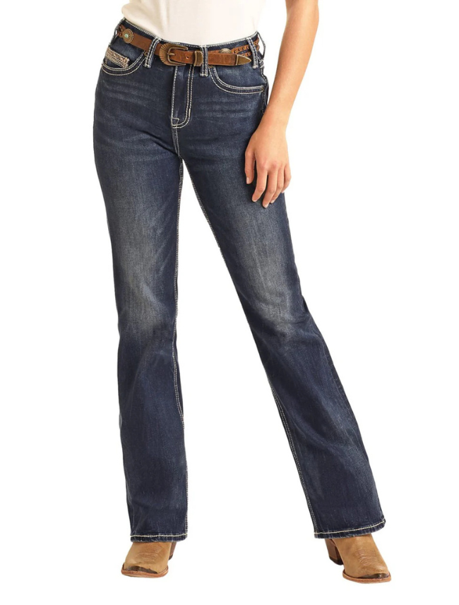 Blue jeans worn by a person on a white background