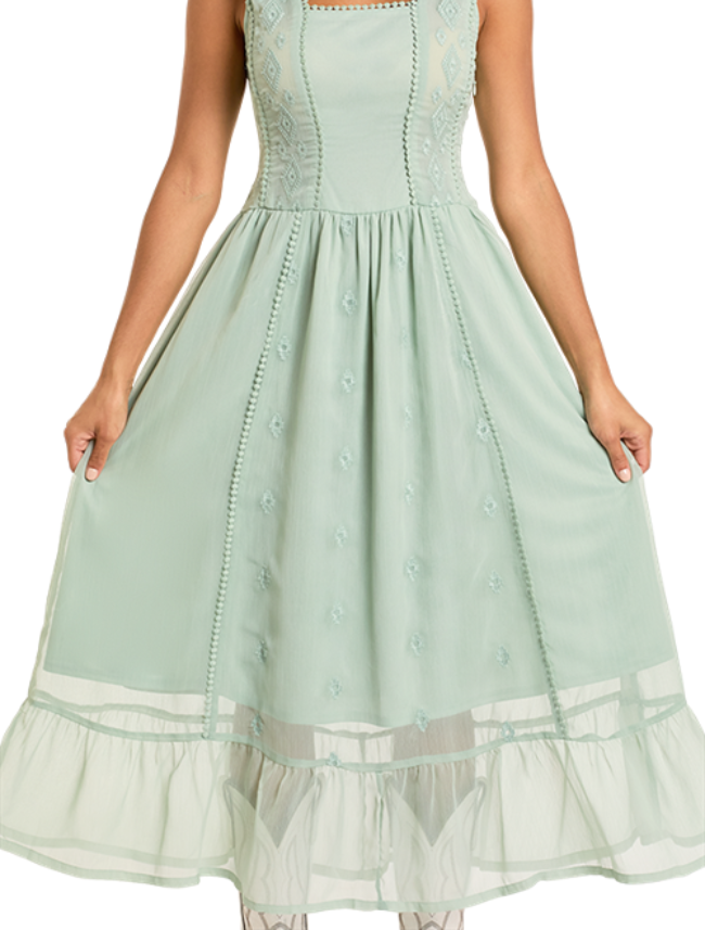 Light green dress with lace details on a white background
