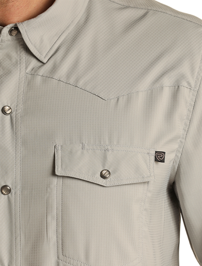 Closeup, front view of the Rock & Roll Denim Men's TEK Long Sleeve Ripstop Western Snap Shirt in grey with emphasis on pocket detail