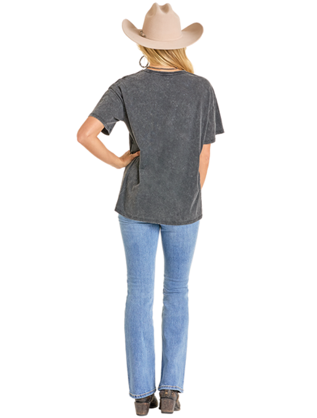 Woman wearing a gray t-shirt and blue jeans with a beige cowboy hat on a white background