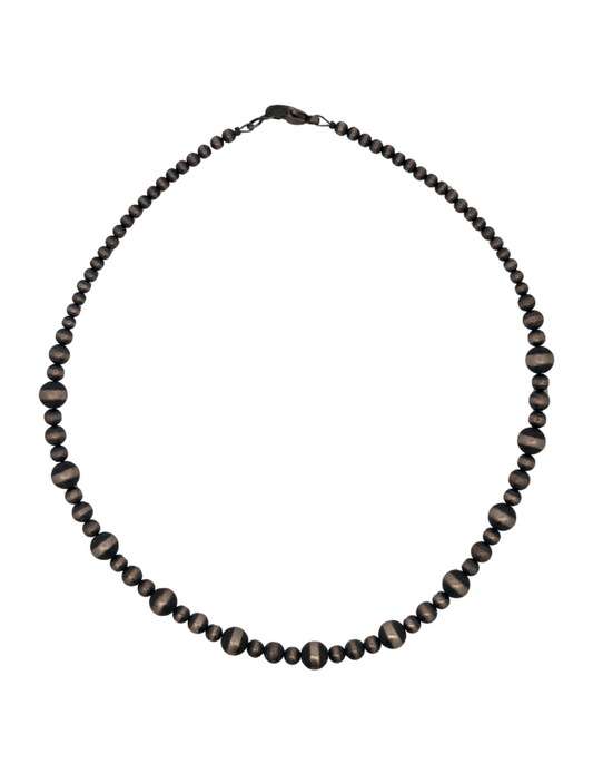 Top-down view of Sterling Silver Beaded Necklace
