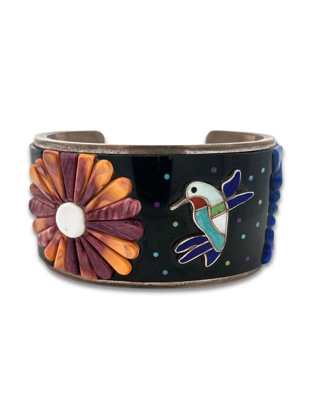 Front view of sterling silver flowers & hummingbird cuff bracelet