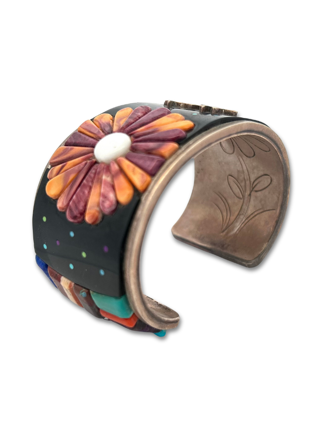 Side view of sterling silver flowers & hummingbird cuff