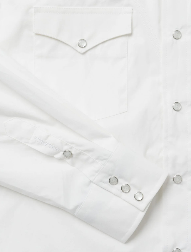 Close-up of a white shirt with button details
