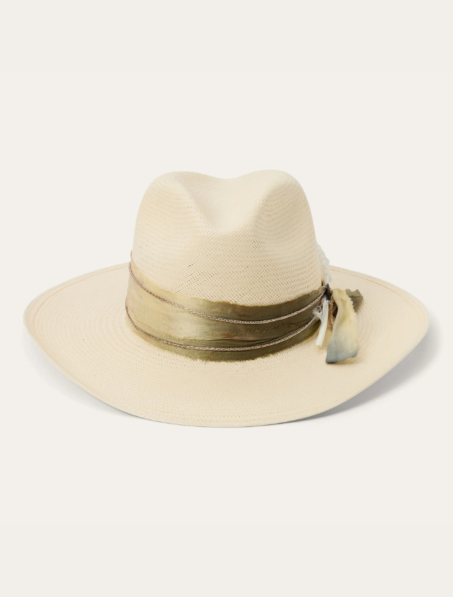 Beige straw hat with a band and tassel on a white background