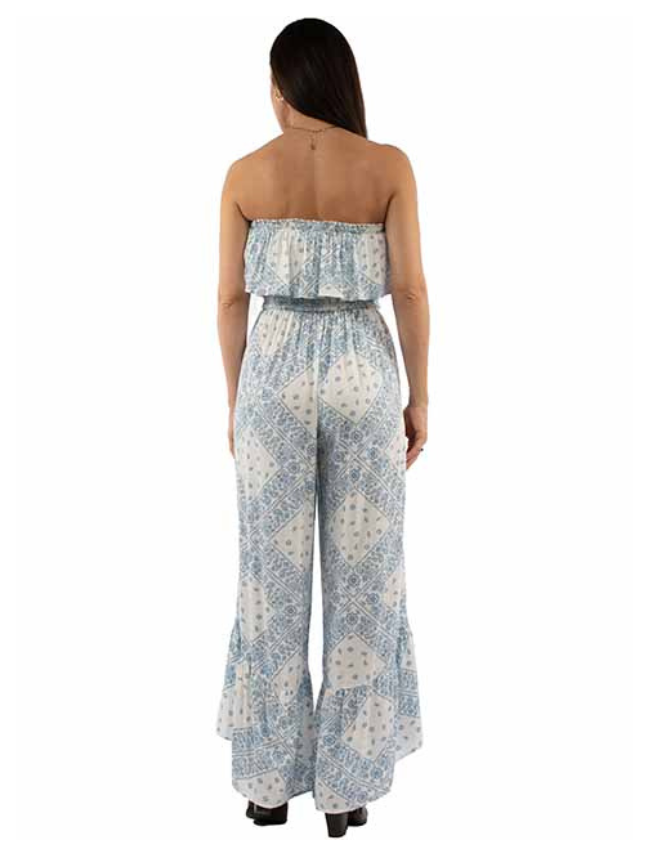 Model wearing Scully strapless ruffle jumpsuit, front view with flowy ruffle detail