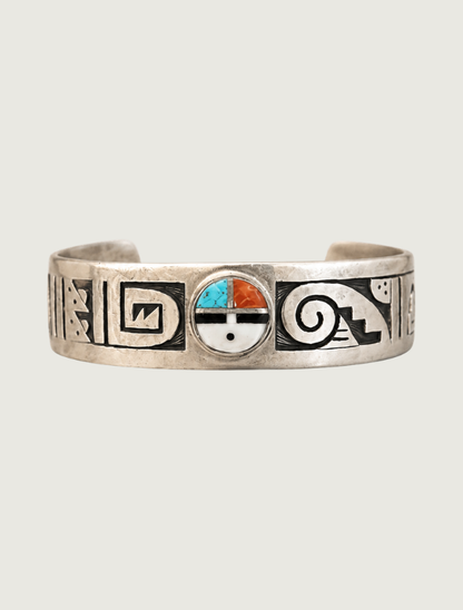Sterling silver Sun Face Kachina cuff bracelet with multi-stone inlay, front view