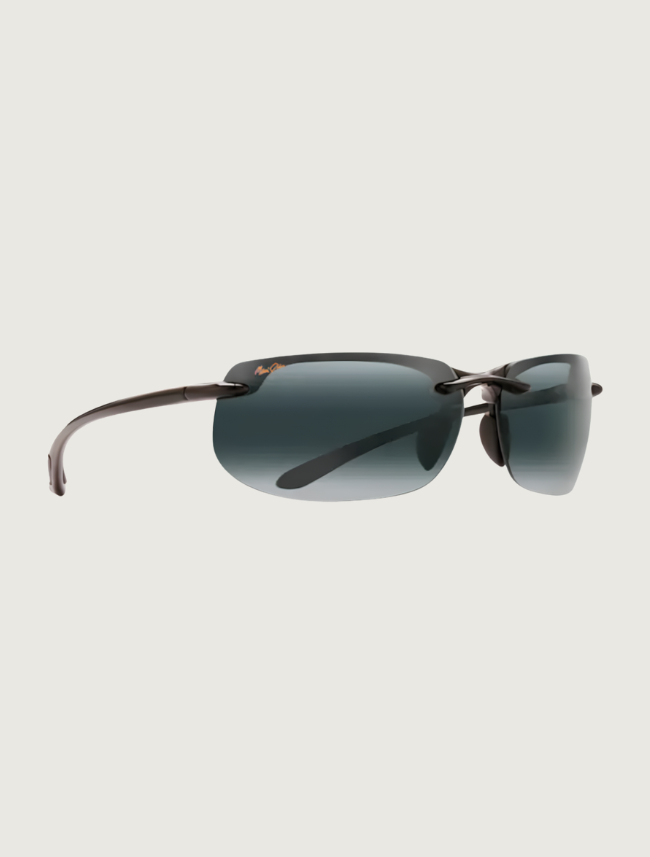 Maui Jim Banyans rimless sunglasses in Gloss Black / Neutral Grey — quarter view