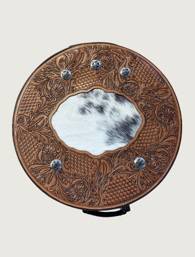 Tooled leather and cowhide hat box, top-down view