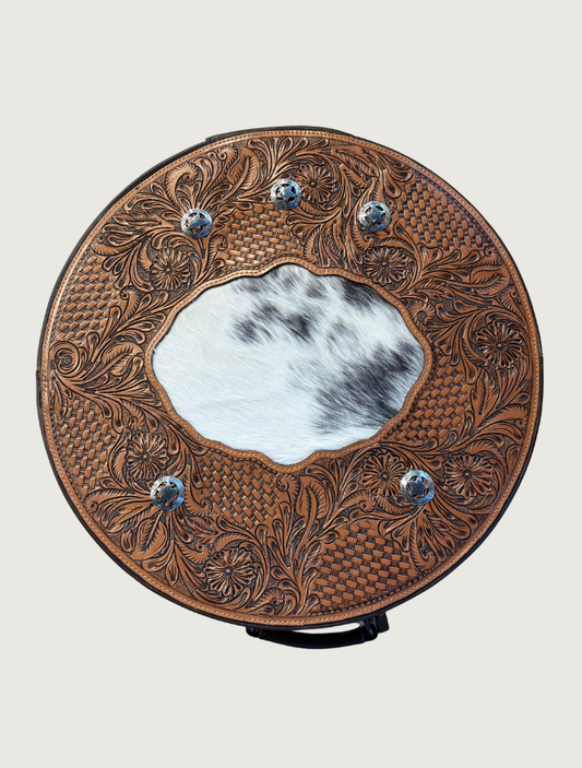 Tooled leather and cowhide hat box, top-down view
