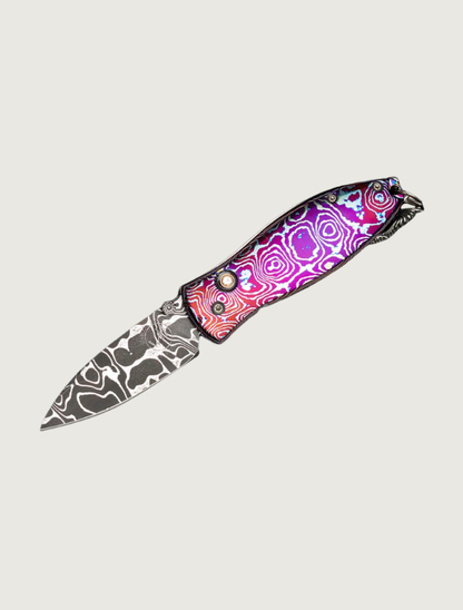 William Henry 'Cosmos' MokuTi Pendant Knife with White Topaz, Sterling Silver, and Damascus Steel Blade