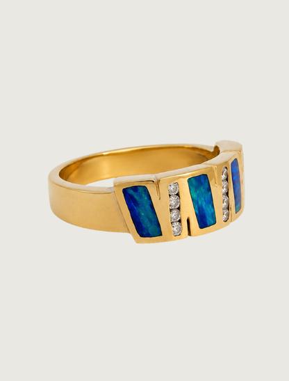 14K yellow gold opal and diamond channel ring, side angle view