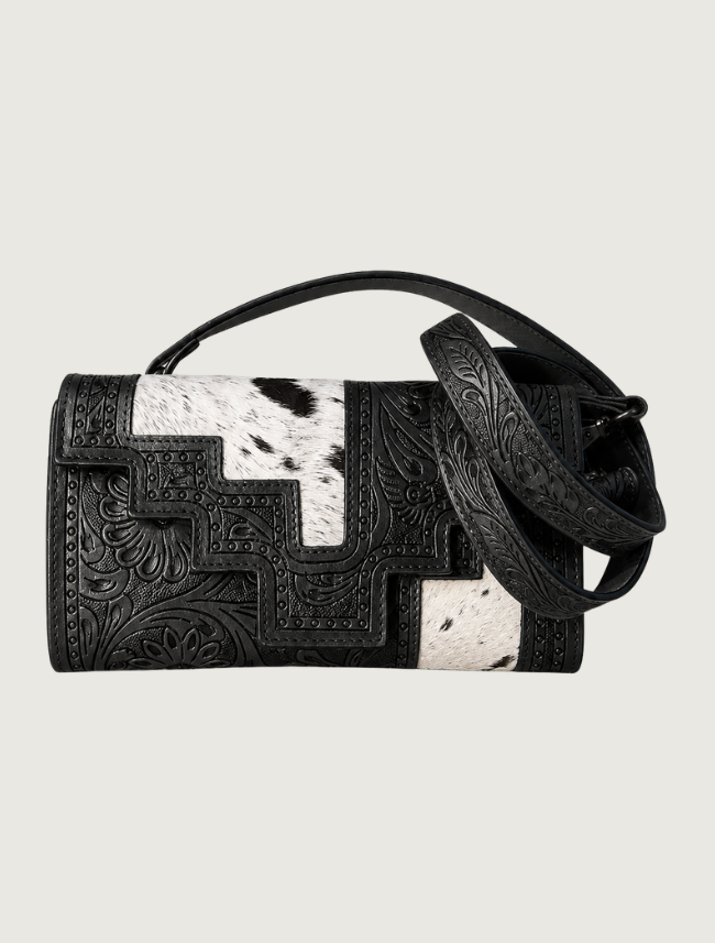 Black tooled leather and cowhide crossbody bag, strap coiled