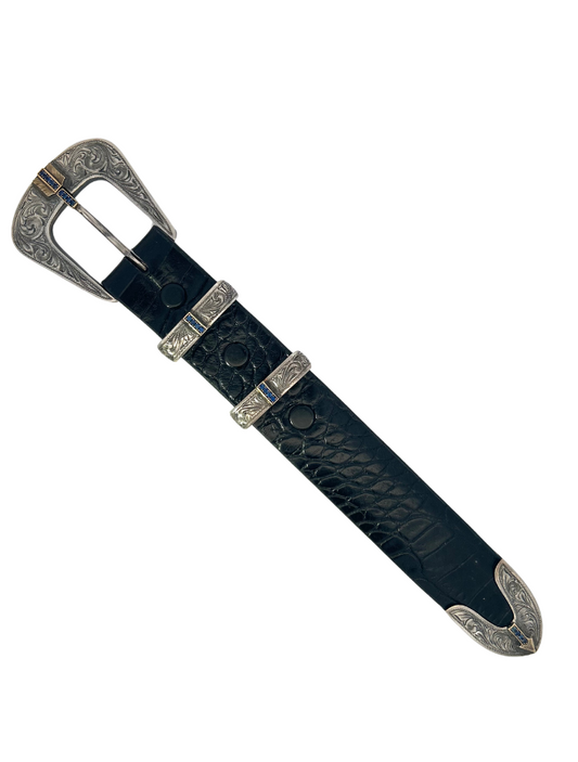 Top side of Clint Orms Sterling Silver, 14K Gold, & Sapphire Belt Buckle Set