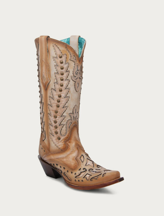 Tan cowboy boot with intricate designs on a white background