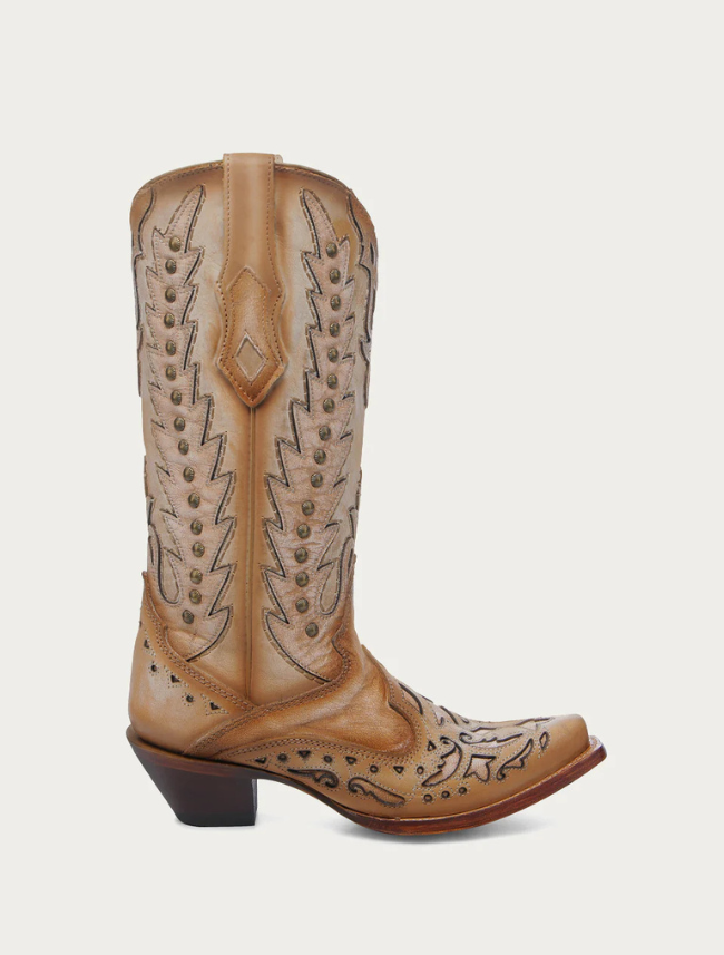 Tan cowboy boot with intricate designs on a white background