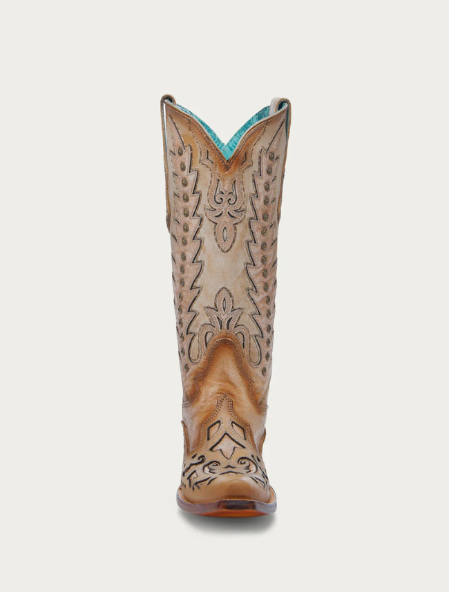 Cowboy boot with intricate designs on a white background