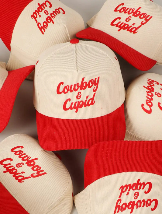 Close-up of Cowboy & Cupid two-tone corduroy cap with western patch detail

