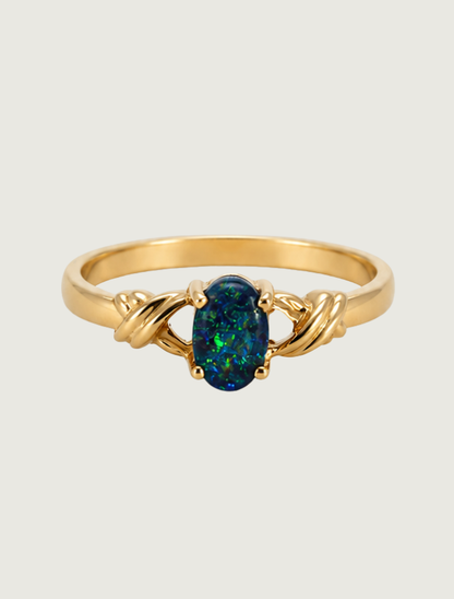 14K yellow gold opal X-wrap ring, front view