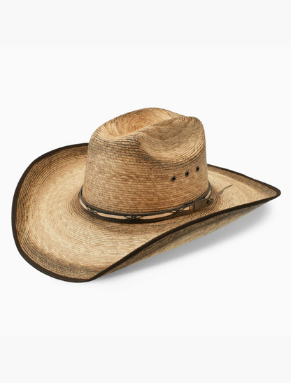 Brown straw cowboy hat on a white background