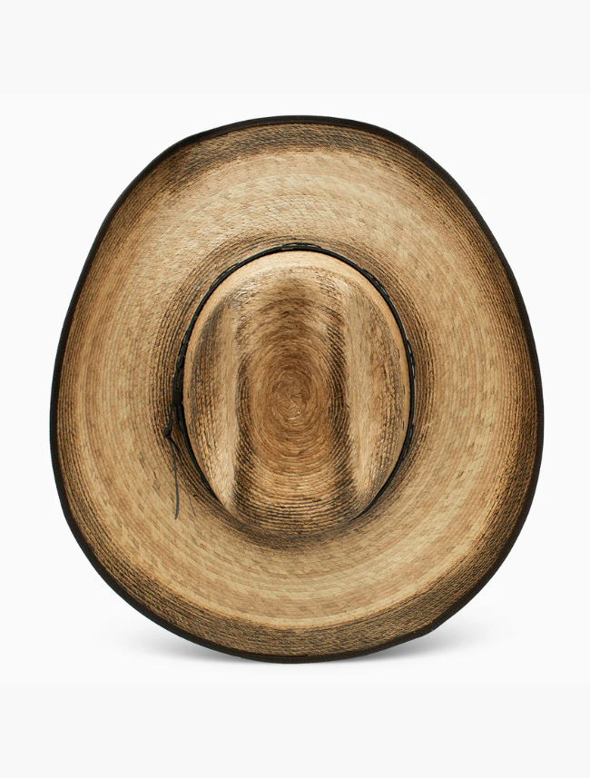 Top-down view of a brown, wide-brimmed straw hat on a white background