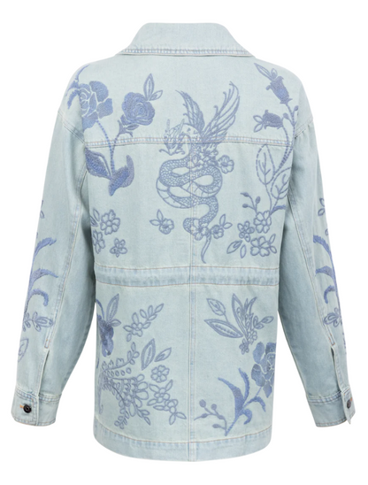 Light blue denim jacket with blue floral and dragon embroidery on a white background