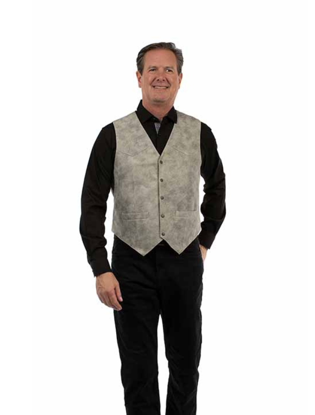 Man wearing a gray vest over a black shirt on a white background