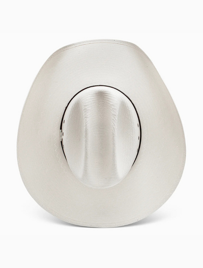 White straw cowboy hat with a brown band on a white background