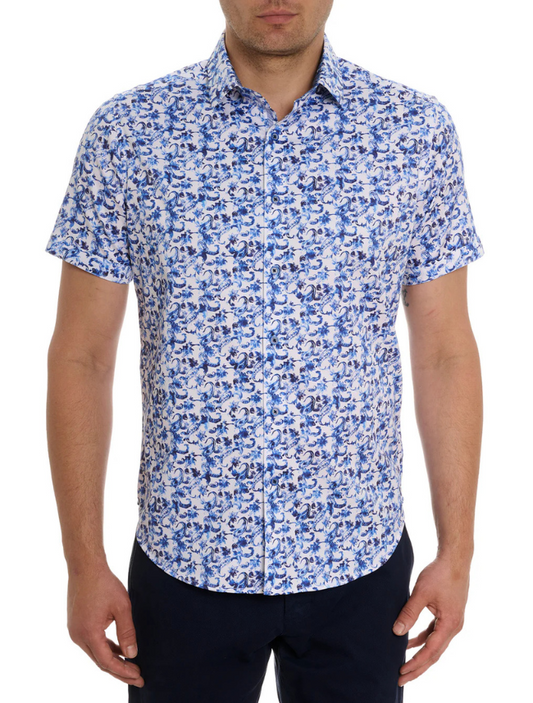 Man wearing a blue and white patterned shirt on a white background