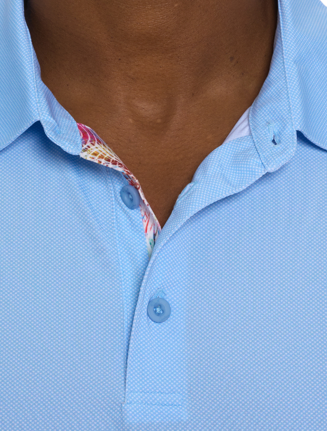 Close-up of Hyde Polo fabric in Blue and buttons – Robert Graham signature details on premium men's polo shirt.