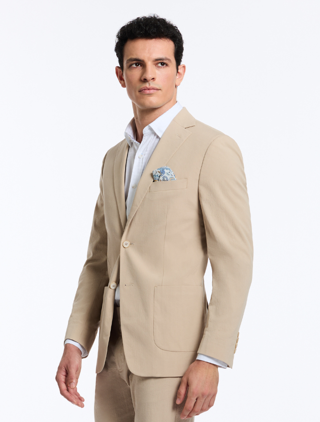 Side view of Robert Graham Rayburn Woven Blazer fabric with blue hankerchief – tan textured weave with detailed stitching.
