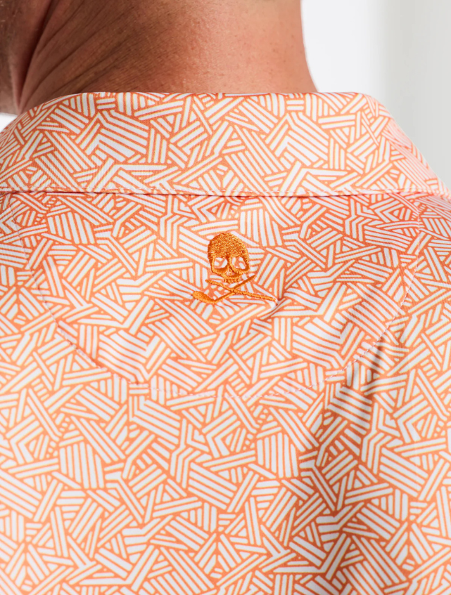 Close-up of Robert Graham Wentz Polo fabric – luxury cotton blend with intricate patterns and subtle logo detailing.