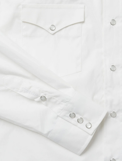 Close-up of a white shirt with button details
